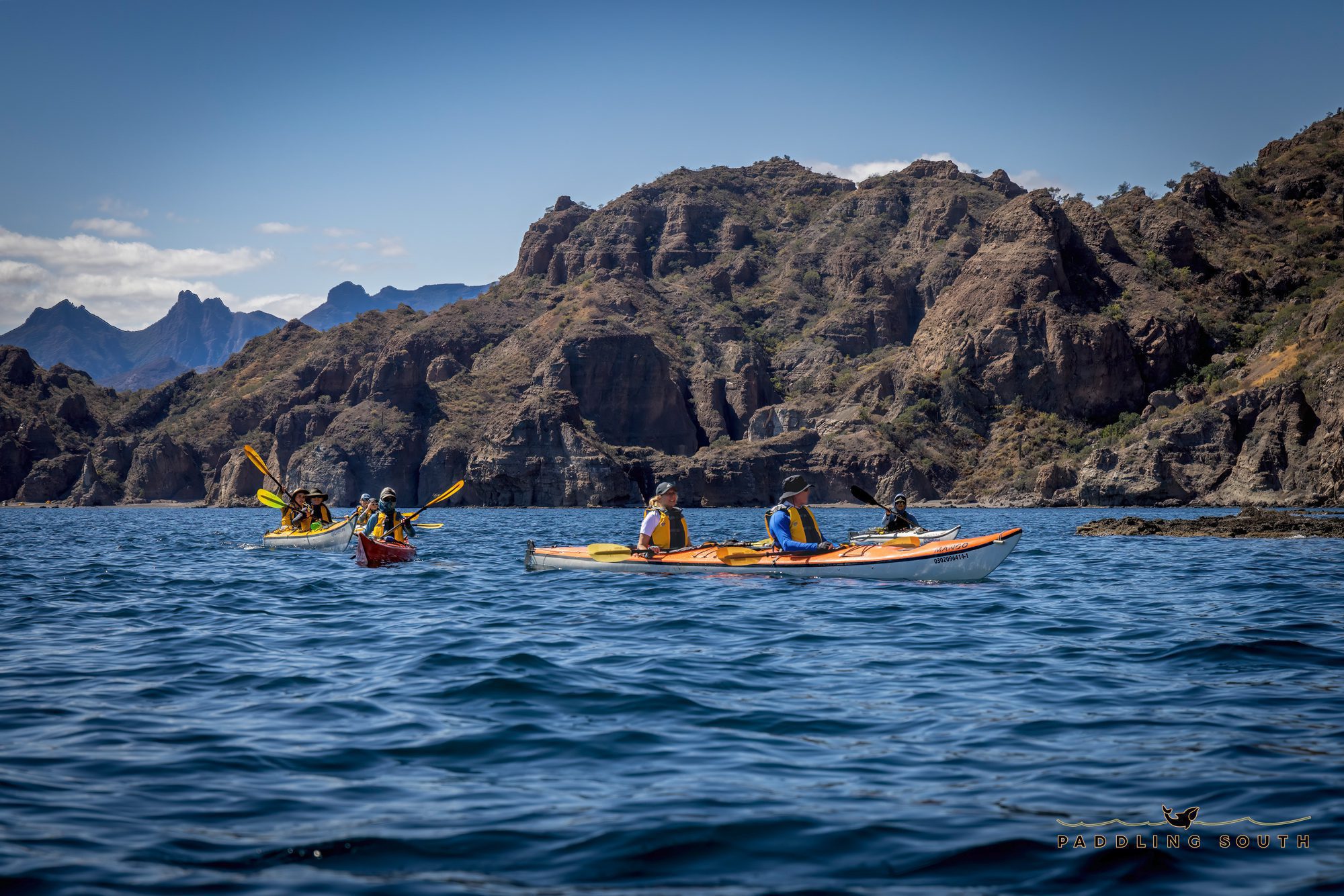 kayaks along the coastline of Baja